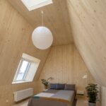 Effekt architects entwarfen ein Wohngebäude, dessen CO2-Fußabdruck dreimal kleiner als der eines typischen dänischen Einfamilienhauses ist.