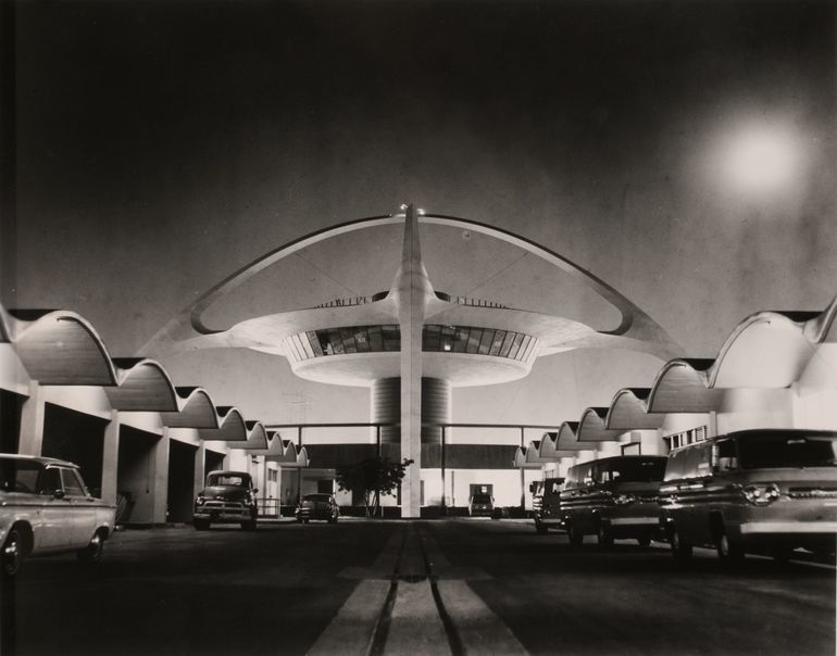 Night_view_of_the_newly_completed_Theme_and_Central_Service_Buildings_at_Los_Angeles_International_Airport,_in_the_early_1960's.