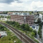 Henning Larsen Architects gestalten wohnliche Unternehmenszentrale der KAB in Kopenhagen, Dänemark